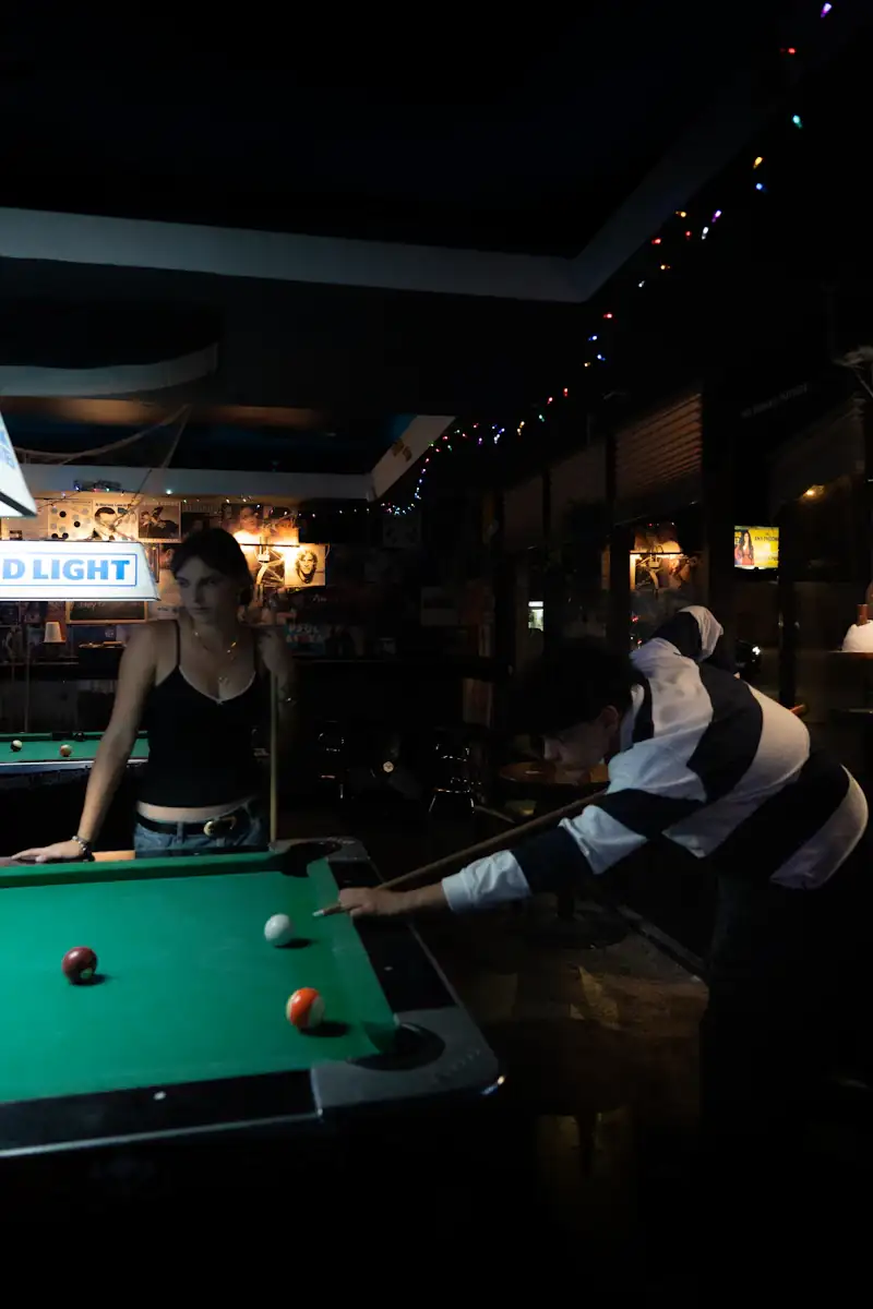 Friends playing pool